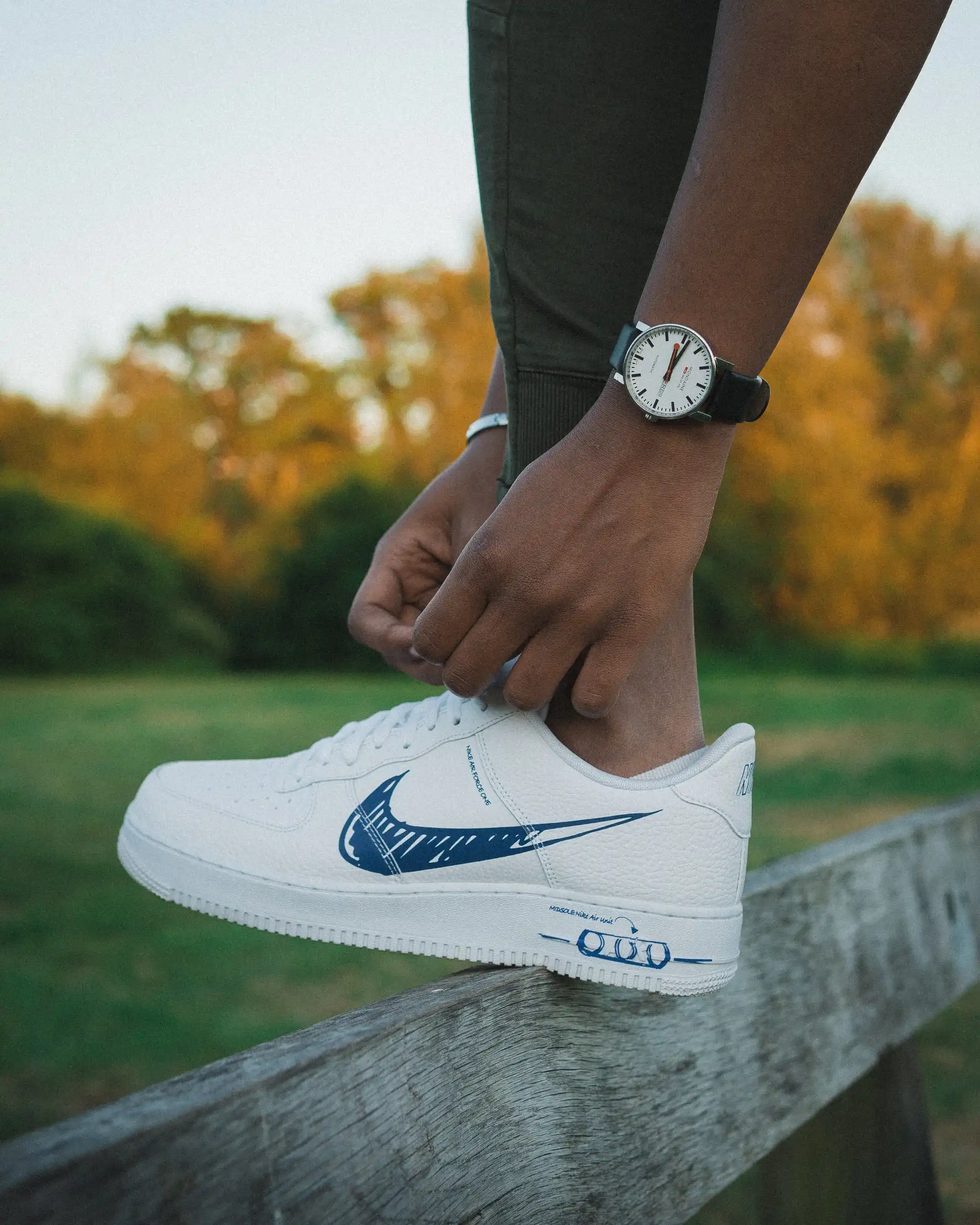 shoes with drawn-on nike symbol